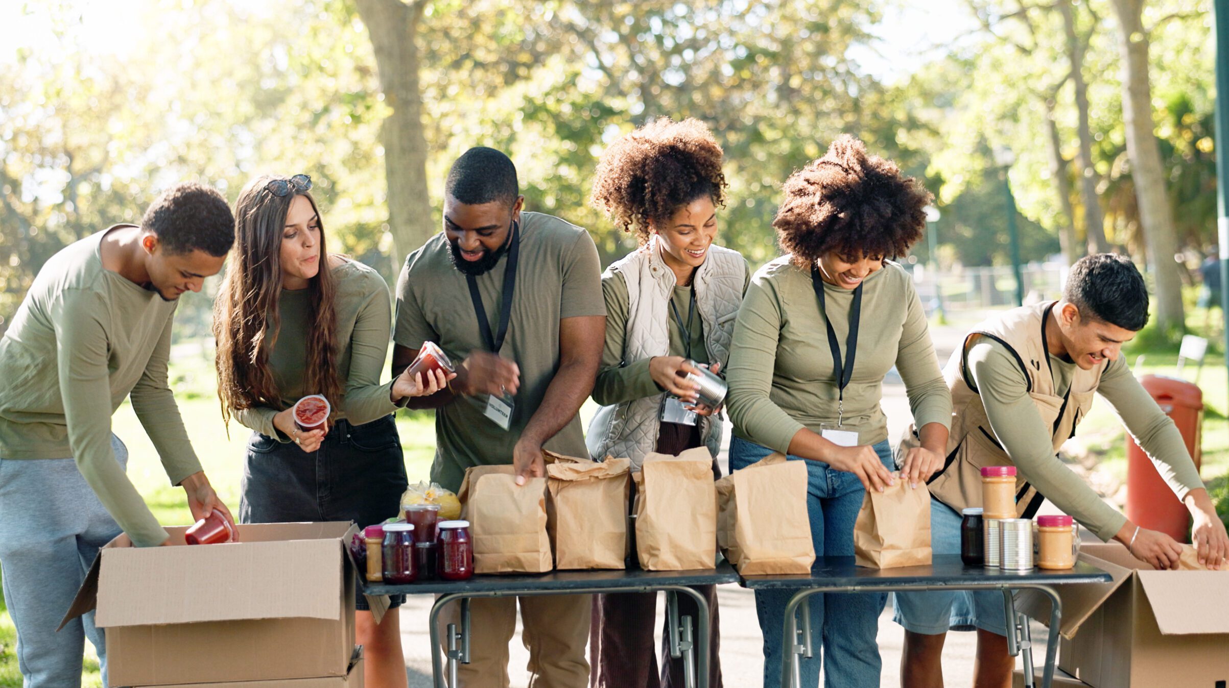 Volunteers distributing nutritious sack meals to support food security in BIPOC communities.